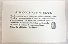 a small printed sheet with "A FONT OF TYPE" at the top and six lines of text below